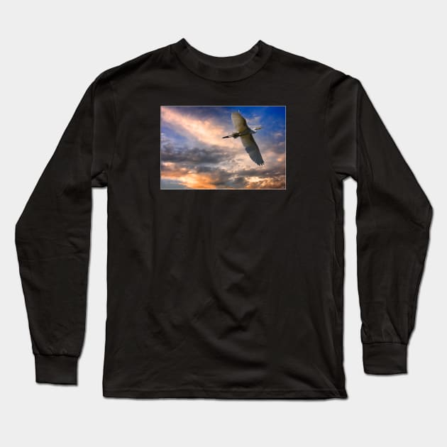 A White Egret Flies Off Under An Evening Sky Long Sleeve T-Shirt by Chris Lord